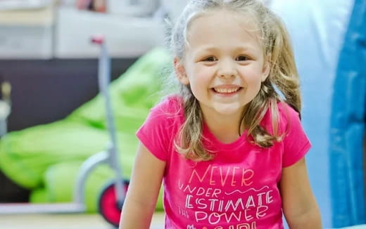 a little girl smiling