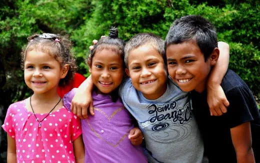 a group of children smiling