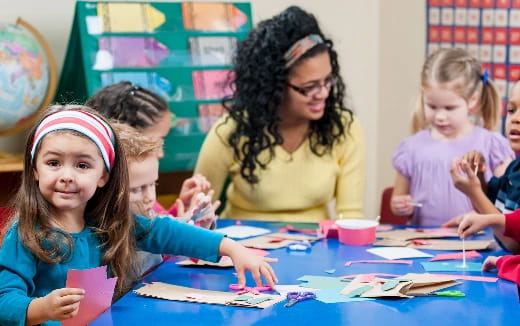 a teacher teaching her students