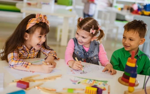 children sitting at a table