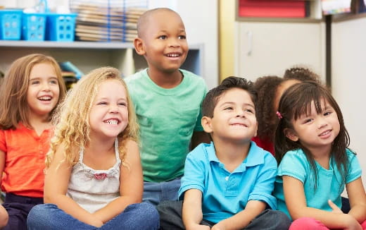 a group of children smiling