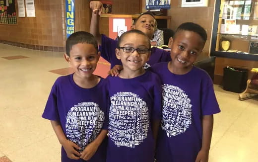 a group of children posing for a photo