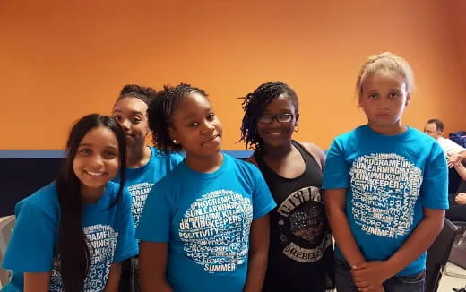 a group of people posing for a photo