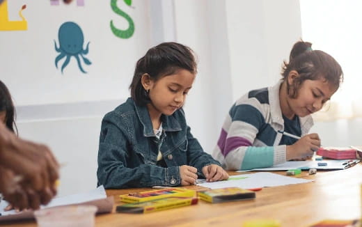 a few women studying at a table