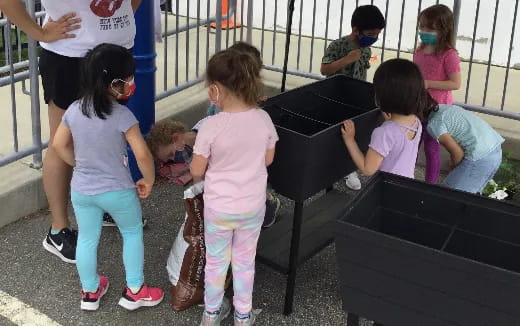 a group of children playing on a stage
