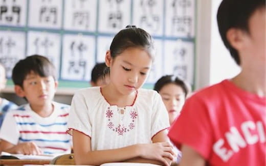 a group of children in a classroom