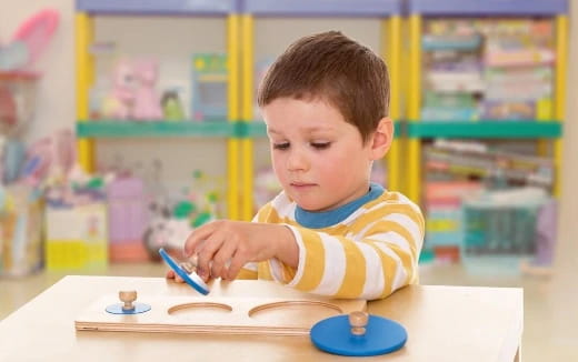 a child playing with a toy