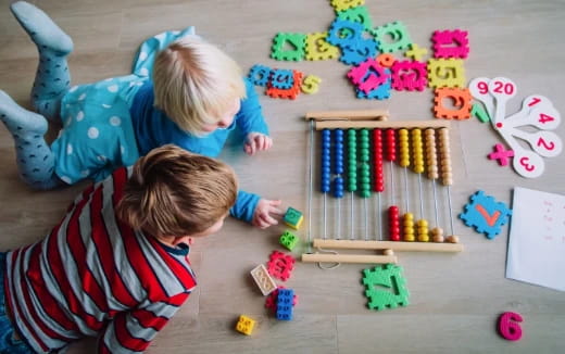 a couple of kids playing with toys
