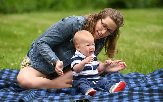 a person holding a baby