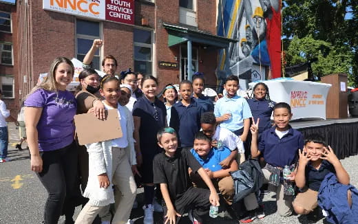 a group of people posing for a photo