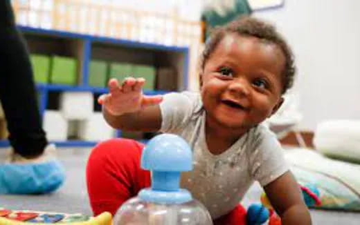 a baby with a bottle