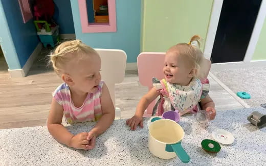 two children playing with toys