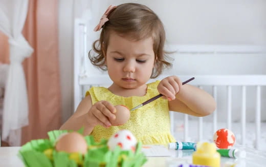 a girl eating a cake