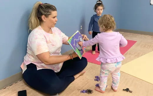 a woman and a couple of children