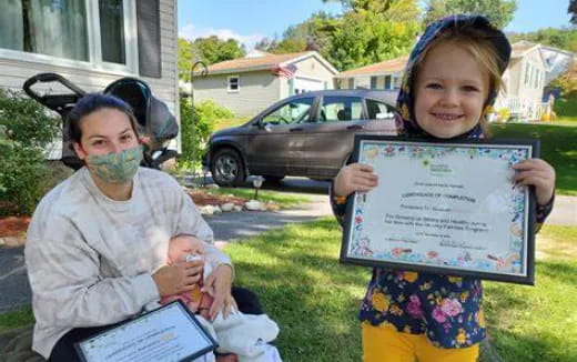 a couple of people holding signs