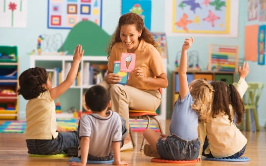 a teacher teaching her students