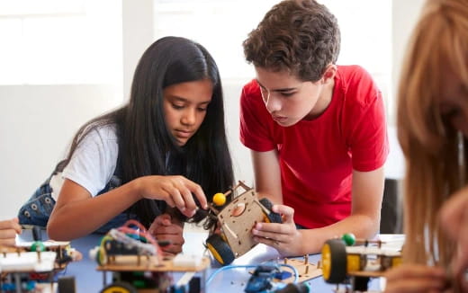 a group of people playing with toys