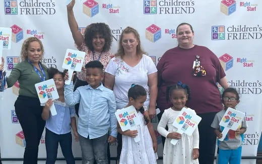 a group of people posing for a photo