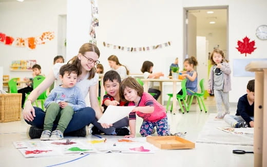 a group of children sitting on the floor