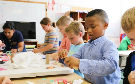 a group of children in a classroom