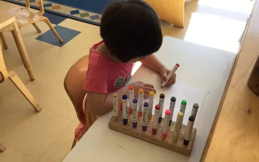 a child playing with a toy