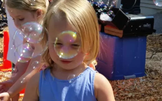 a couple of children with paint on their faces