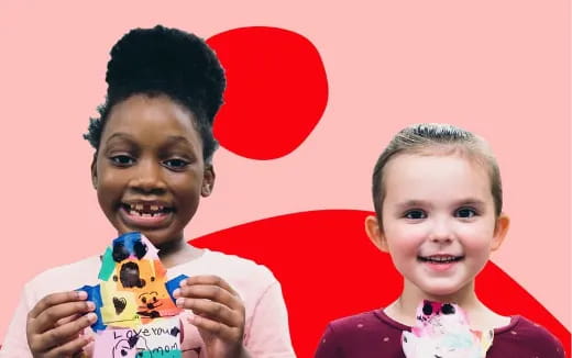 a couple of children smiling