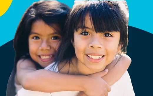 a couple of girls smiling