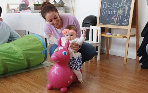 a person holding a baby