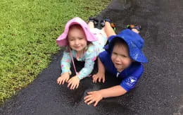 two children in a stroller