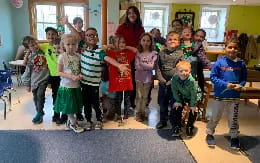 a group of children posing for a photo