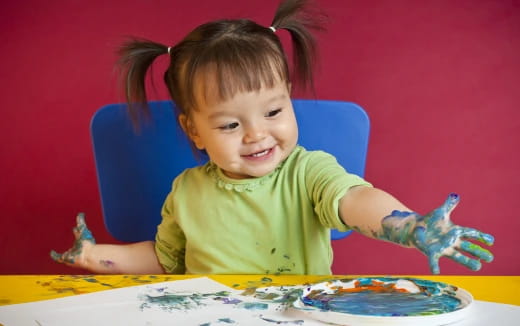 a child sitting at a table