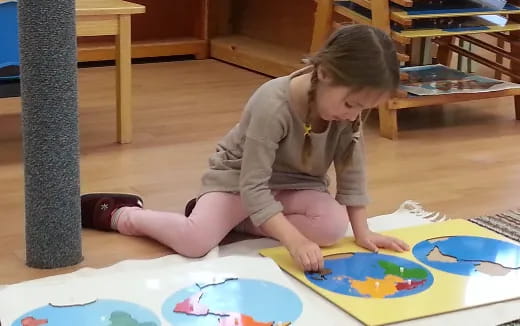 a child playing with a toy