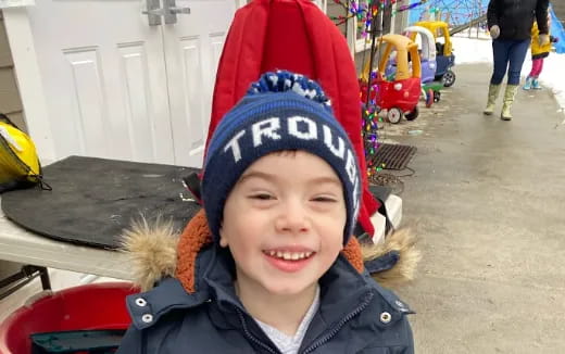 a child wearing a hat