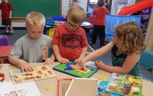 children sitting at a table