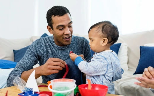 a person holding a baby