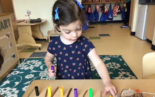 a young girl painting