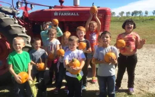 a group of children posing for a photo