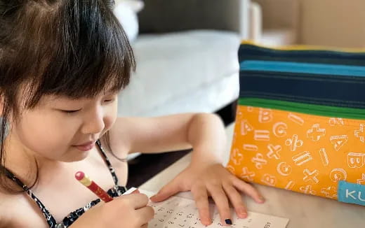 a baby playing with a toy
