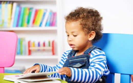 a child reading a book