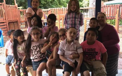 a group of children posing for a photo