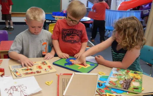 children sitting at a table