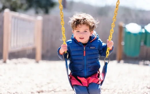 a child on a swing