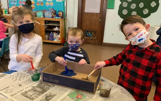 a group of children wearing masks