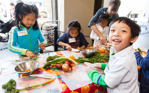 a group of children eating food