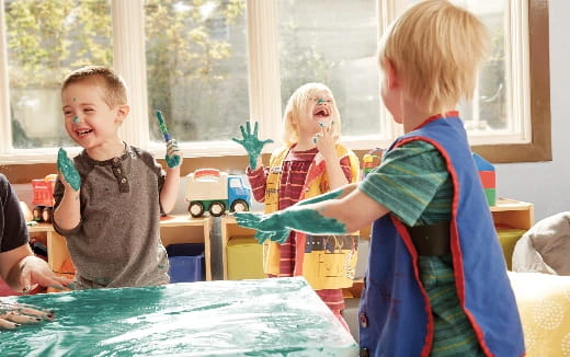 a group of children playing with toys