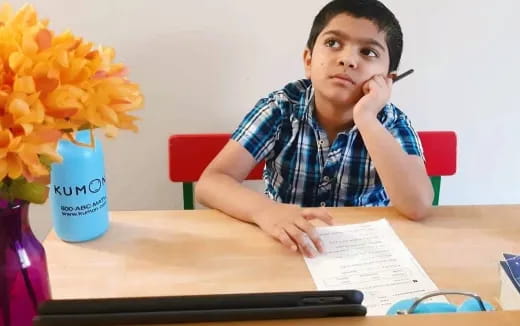a person sitting at a table