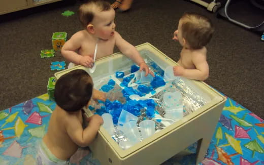 a group of kids playing with toys