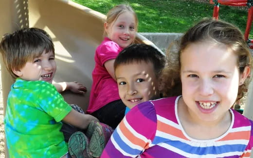 a group of children smiling