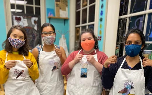 a group of people wearing masks